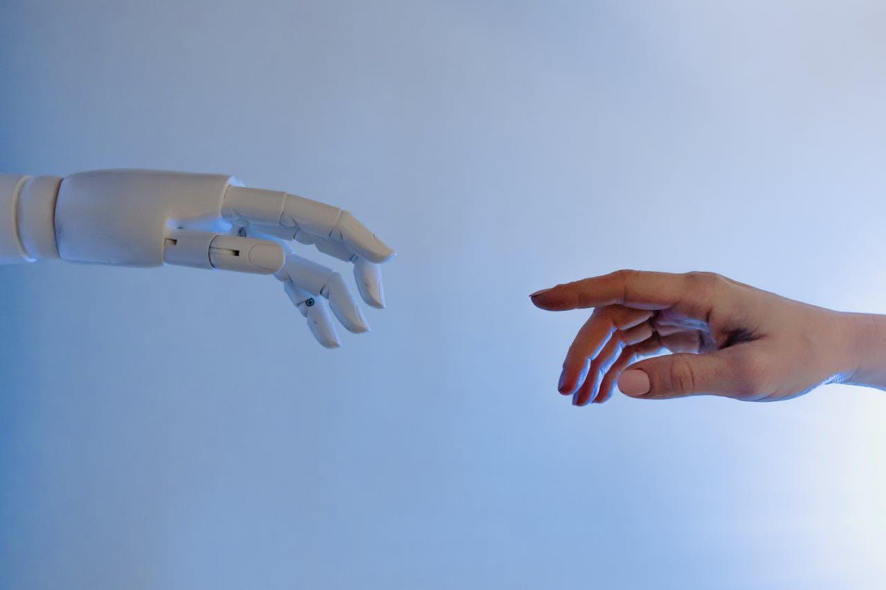 Person reaching out to robot AI and digital asset management using Lightrocket.